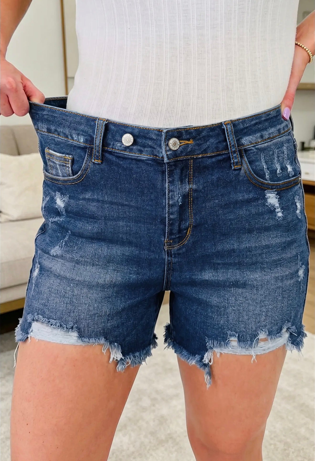 Asymmetric Raw Hem Distressed Whiskery Denim Shorts
