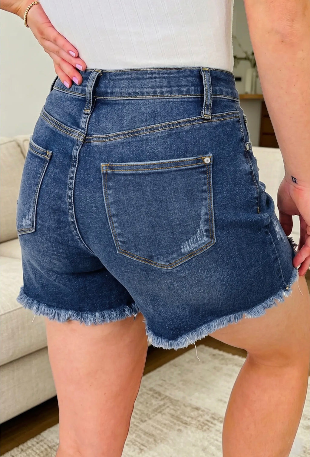 Asymmetric Raw Hem Distressed Whiskery Denim Shorts