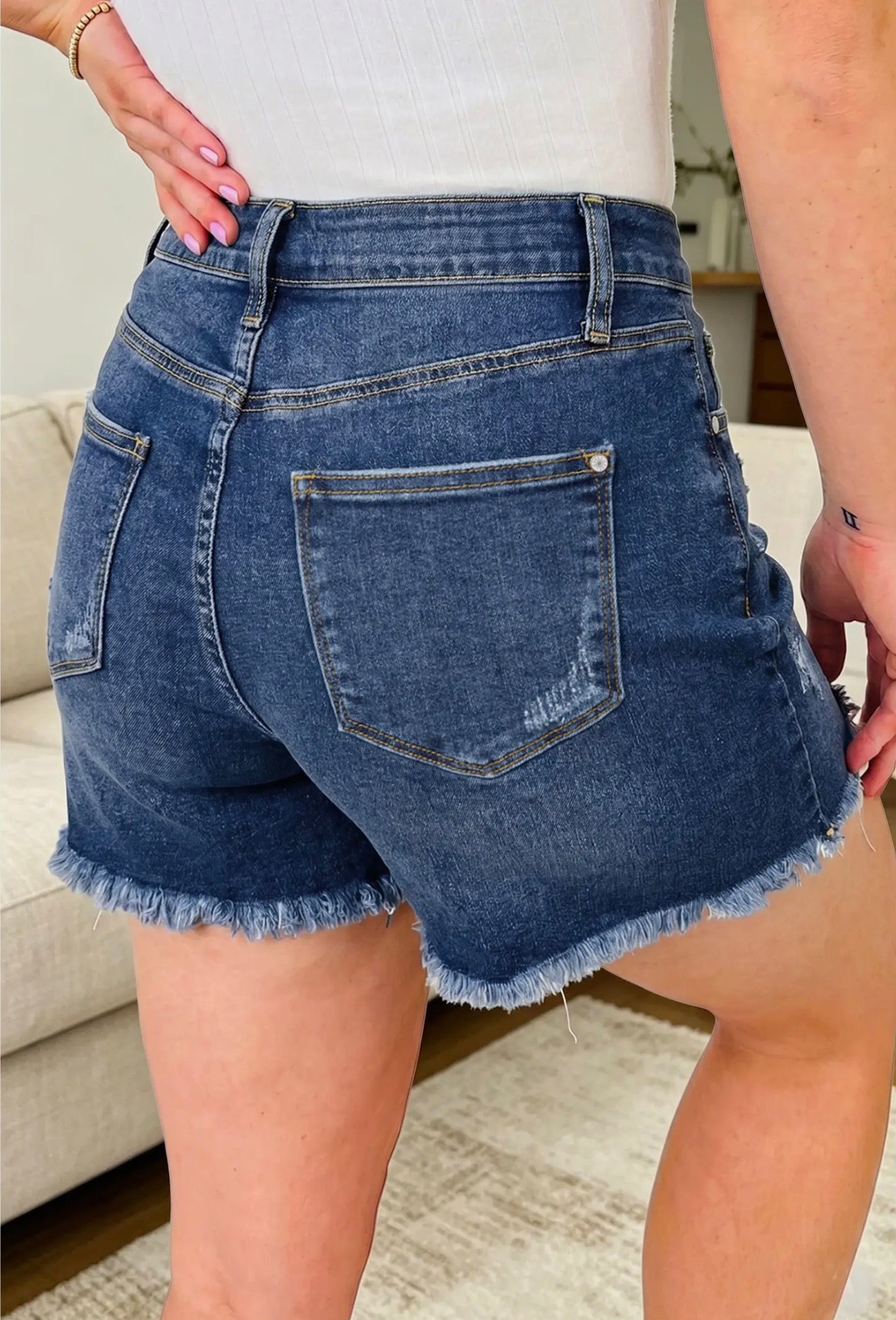 Asymmetric Raw Hem Distressed Whiskery Denim Shorts